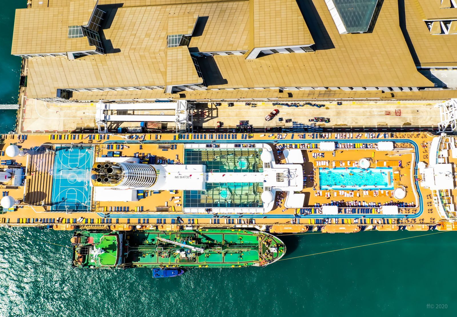 Aerial view of a cruise ship&rsquo;s pool deck alongside the pier