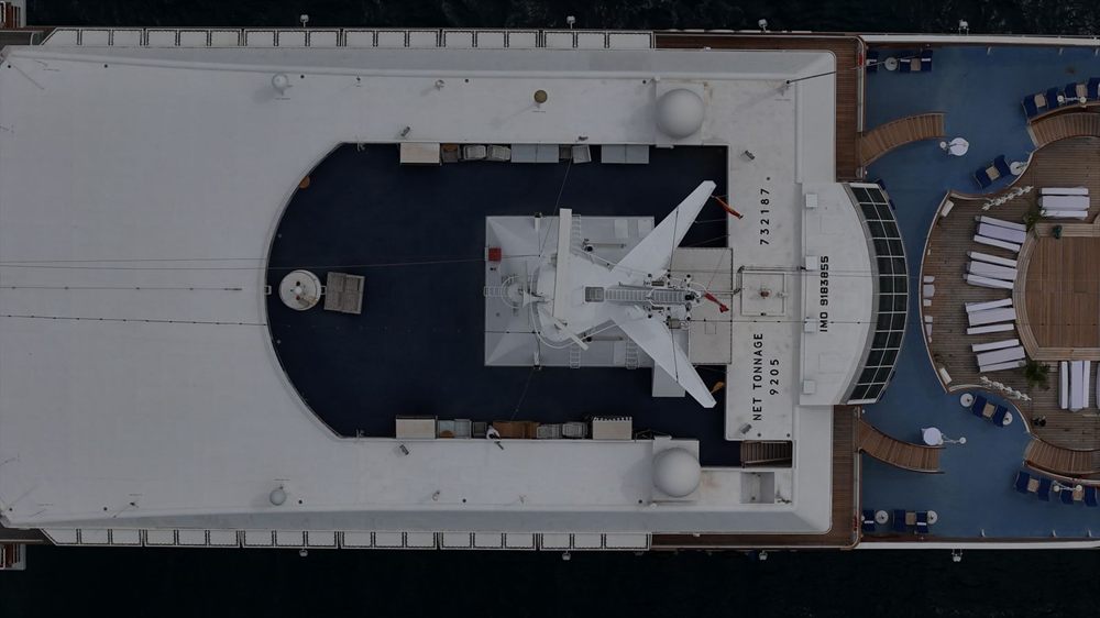 Aerial view straight down onto the top deck of a cruise ship